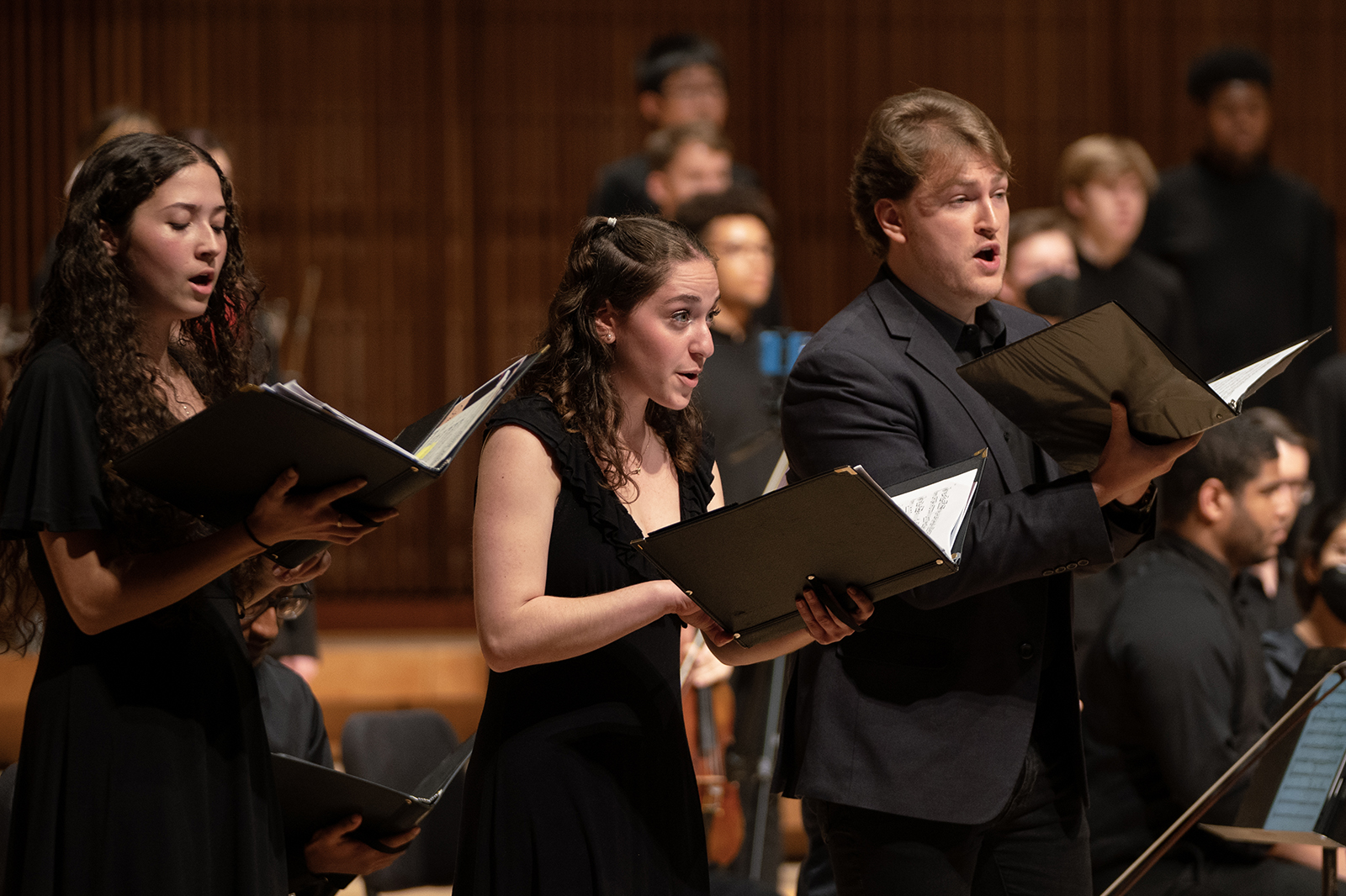Members of the UMD Chamber Singers sing during a performance.