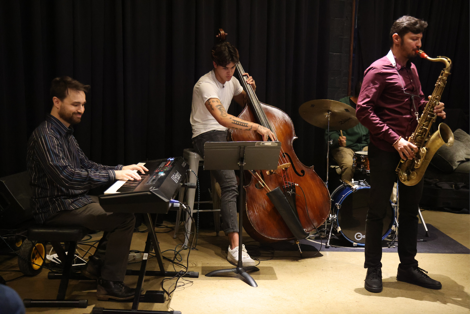 Three people play jazz instruments at The Hall CP.