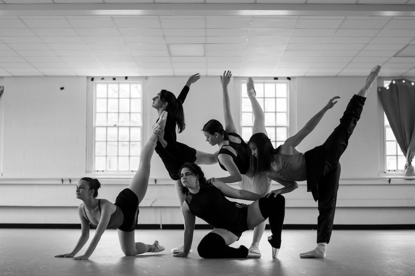 Ballet Company M dancers rehearse in a dance studio.