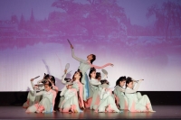 The Tianyi Dance Team performances on stage.