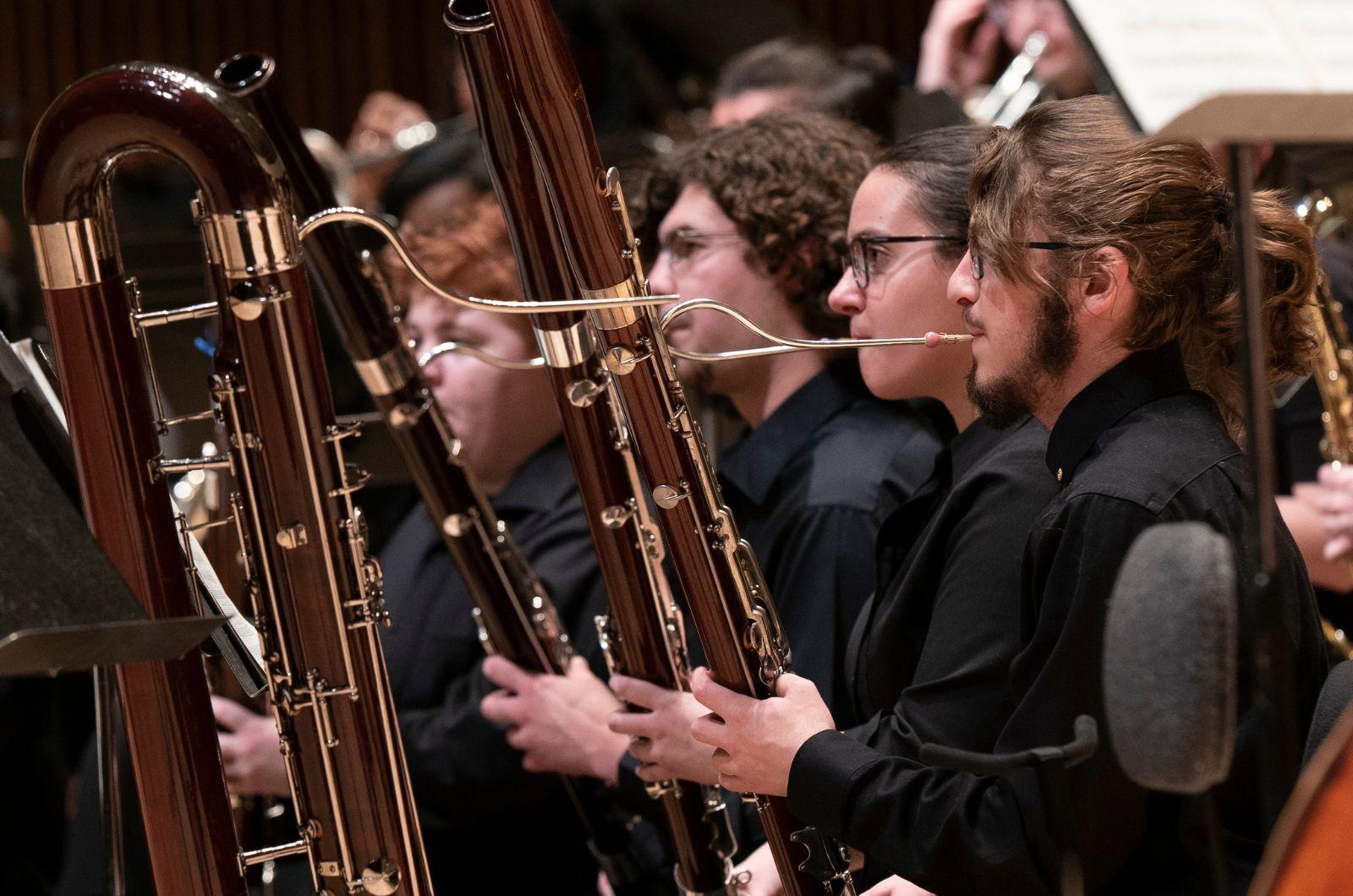 Members of the UMD Wind Ensemble play bassons during a performance.