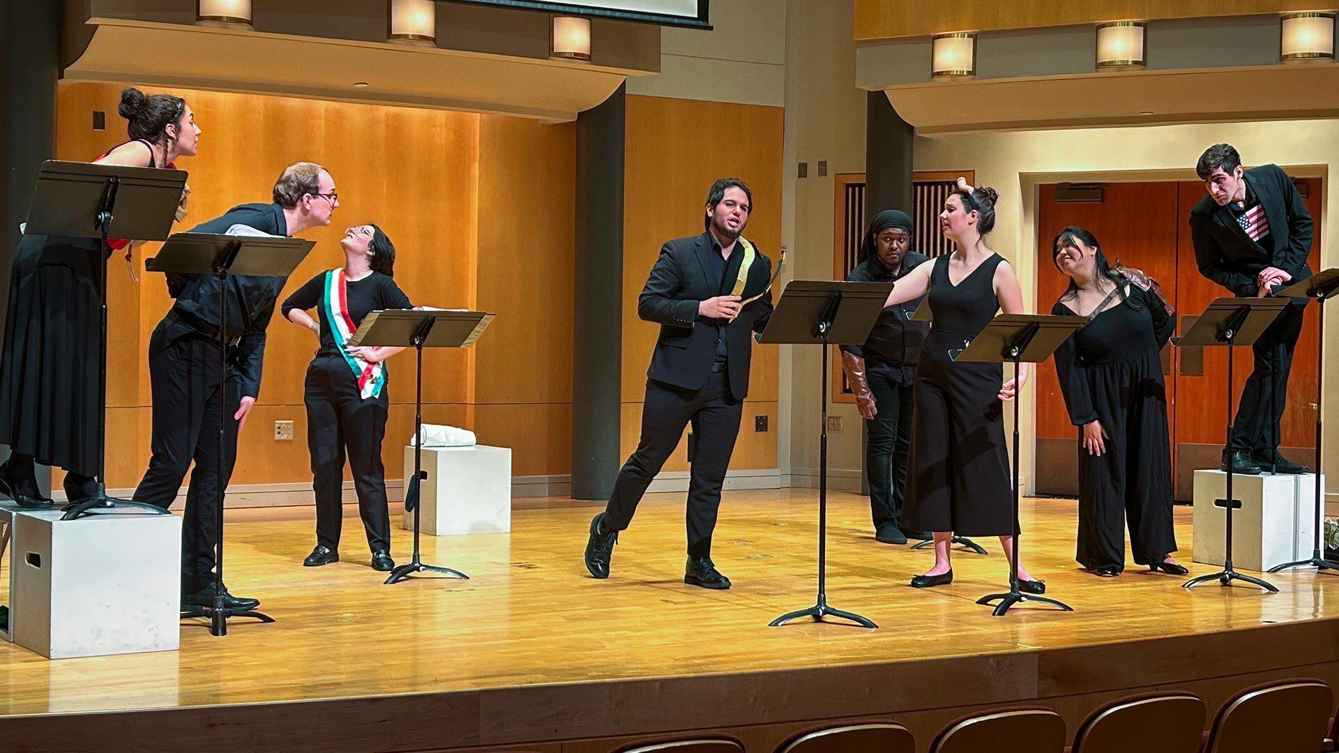 Opera students perform on stage.