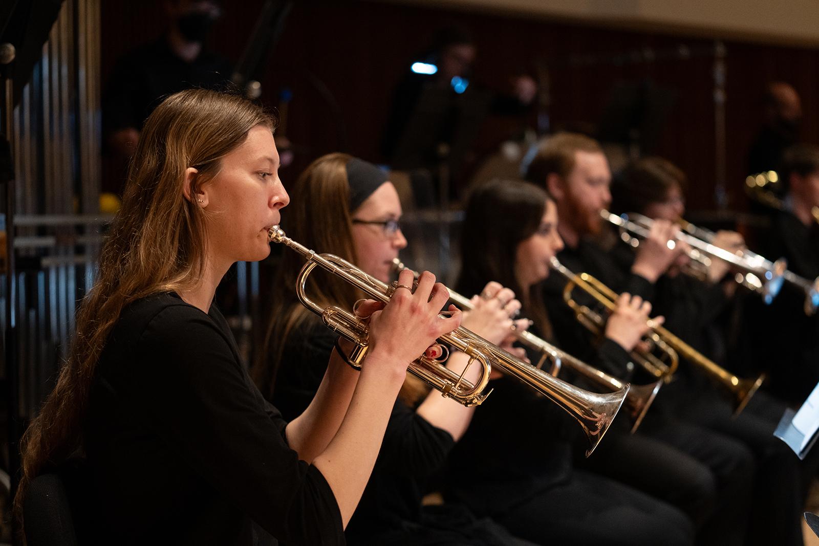 Trumpet players.