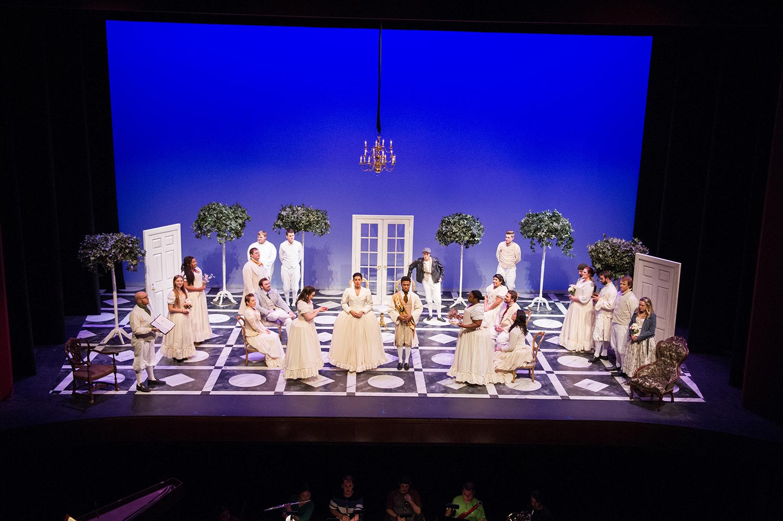 The Maryland Opera Studio performs in costume on stage.