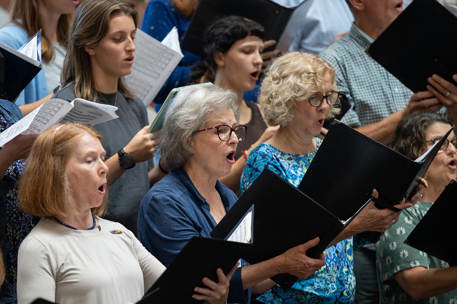 UMD's summer chorus members sing together.