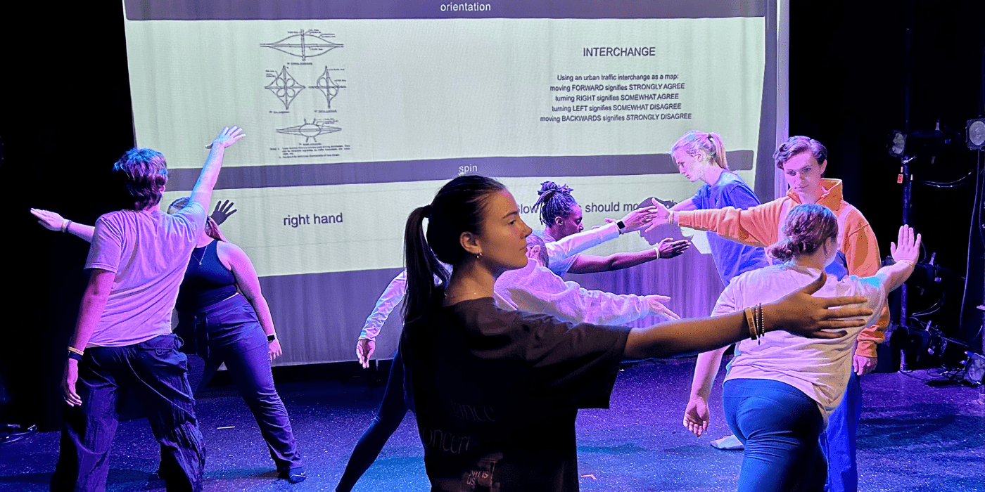 A group of people participate in Lins Derry's rearch project on dance and data communication. 